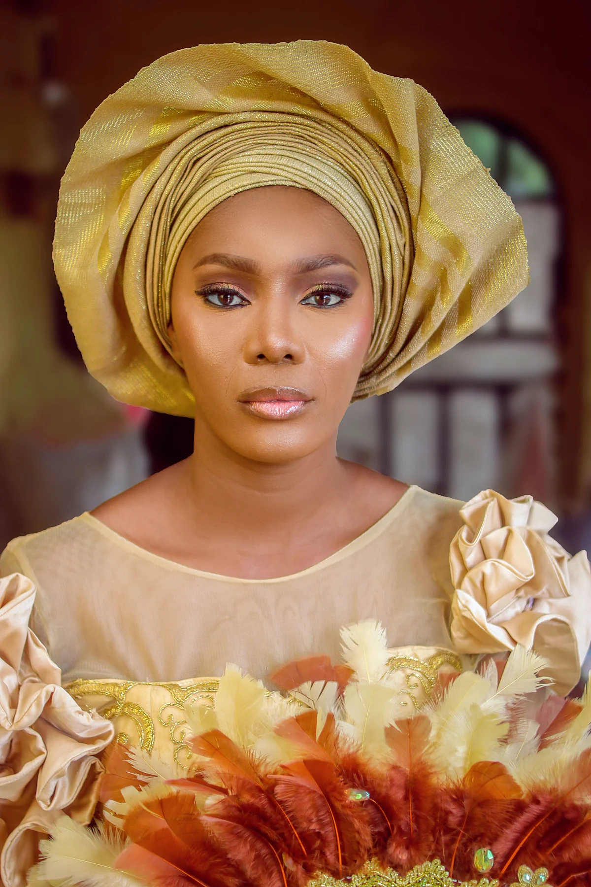 Nigerian bride in gold gele